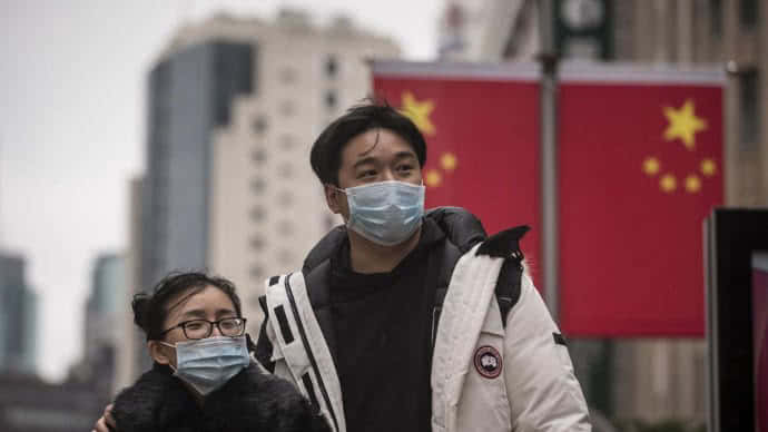 Китай усилил карантин в части Пекина из-за новой вспышки COVID-19