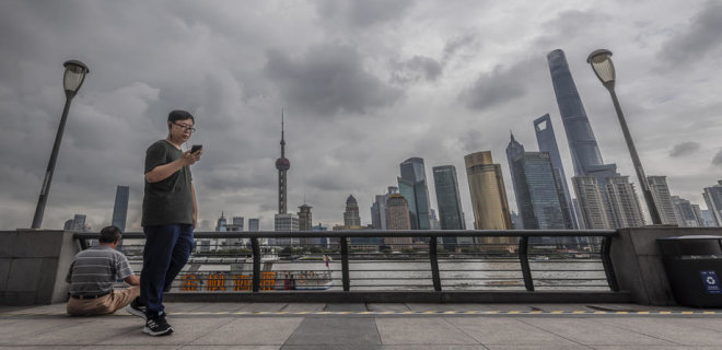 Центральный банк Китая впервые за 20 месяцев снизил базовую ставку